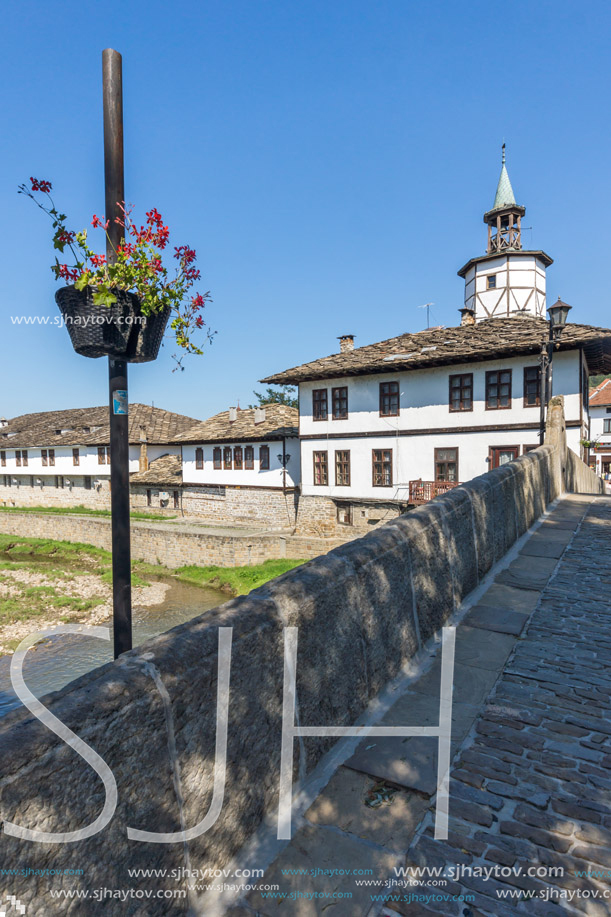 TRYAVNA, BULGARIA - JULY 6, 2018: Garbaviat (Humpback) Bridge and Medieval clock Tower at the Center of historical town of Tryavna, Gabrovo region, Bulgaria