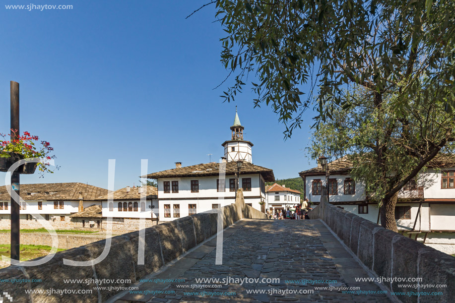 TRYAVNA, BULGARIA - JULY 6, 2018: Garbaviat (Humpback) Bridge and Medieval clock Tower at the Center of historical town of Tryavna, Gabrovo region, Bulgaria