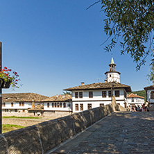 TRYAVNA, BULGARIA - JULY 6, 2018: Garbaviat (Humpback) Bridge and Medieval clock Tower at the Center of historical town of Tryavna, Gabrovo region, Bulgaria