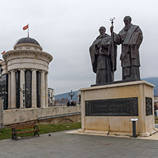 SKOPJE, REPUBLIC OF MACEDONIA - FEBRUARY 24, 2018:  Monument of St. Cyril and Methodius and Archaeological Museum in Skopje, Republic of Macedonia