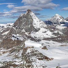 Amazing Winter view of mount Matterhorn covered with clouds, Canton of Valais, Alps, Switzerland