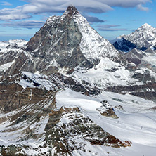 Amazing Winter view of mount Matterhorn covered with clouds, Canton of Valais, Alps, Switzerland