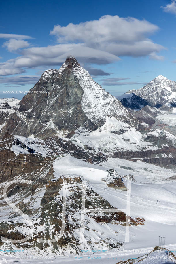 Amazing Winter view of mount Matterhorn covered with clouds, Canton of Valais, Alps, Switzerland