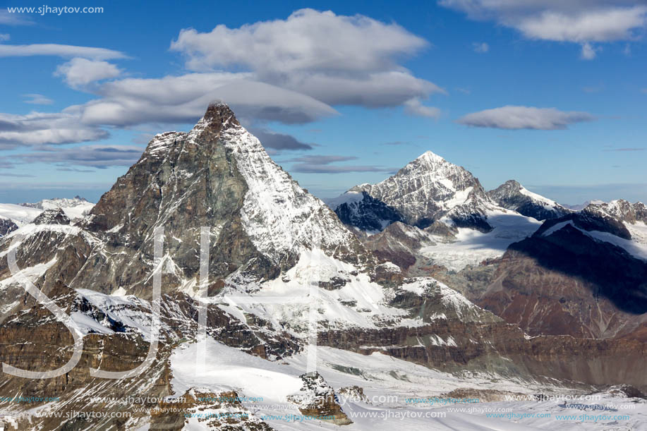 Amazing Winter view of mount Matterhorn covered with clouds, Canton of Valais, Alps, Switzerland