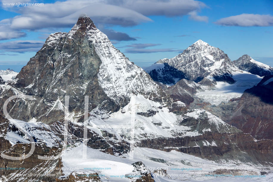 Amazing Winter view of mount Matterhorn covered with clouds, Canton of Valais, Alps, Switzerland