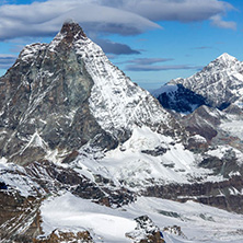 Amazing Winter view of mount Matterhorn covered with clouds, Canton of Valais, Alps, Switzerland