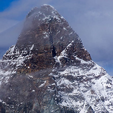 Amazing Winter view of mount Matterhorn covered with clouds, Canton of Valais, Alps, Switzerland