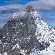 Amazing Winter view of mount Matterhorn covered with clouds, Canton of Valais, Alps, Switzerland