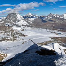 Amazing Winter view of mount Matterhorn covered with clouds, Canton of Valais, Alps, Switzerland