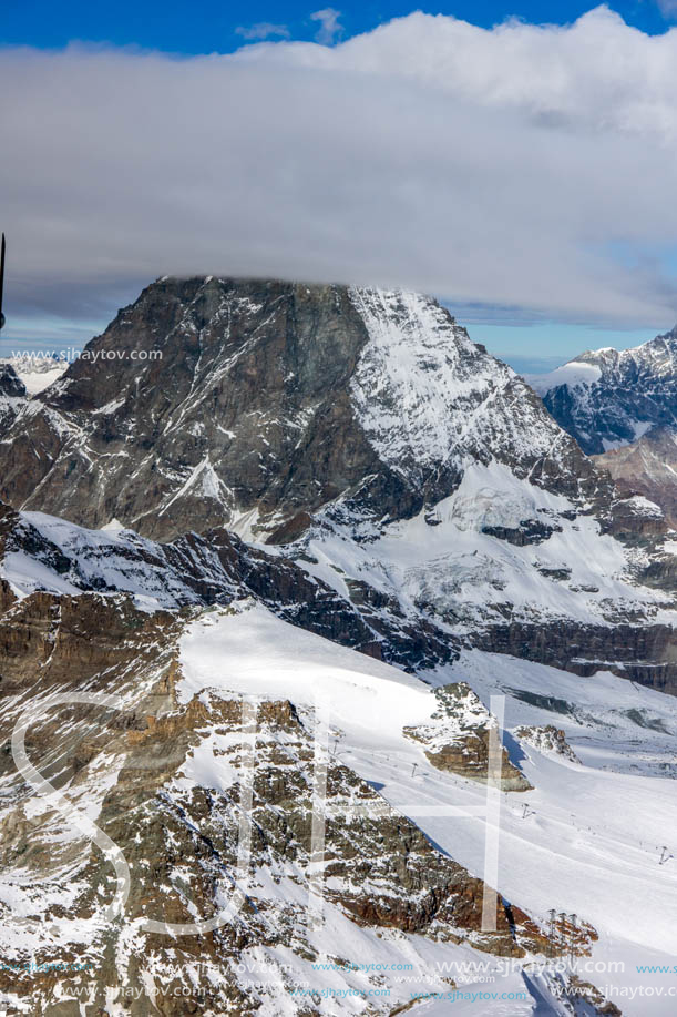 Amazing Winter view of mount Matterhorn covered with clouds, Canton of Valais, Alps, Switzerland