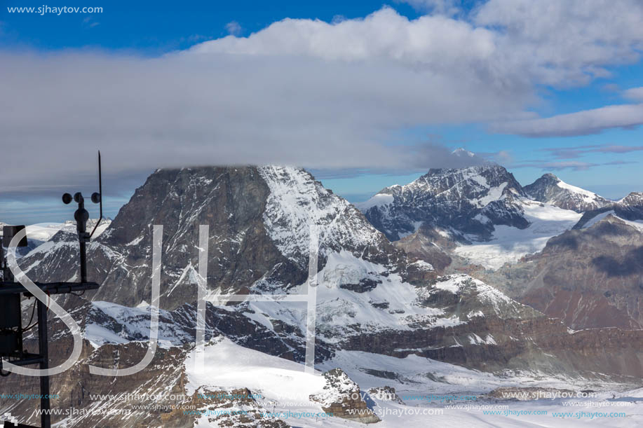 Amazing Winter view of mount Matterhorn covered with clouds, Canton of Valais, Alps, Switzerland