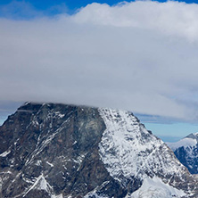 Amazing Winter view of mount Matterhorn covered with clouds, Canton of Valais, Alps, Switzerland