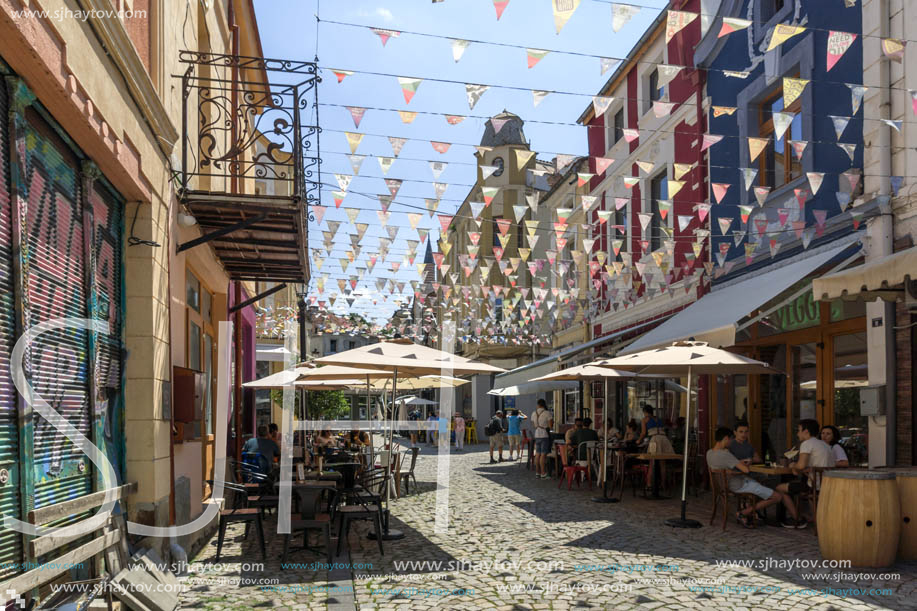 KAPANA, PLOVDIV, BULGARIA - JULY 5, 2018:  Street and houses in district Kapana, city of Plovdiv, Bulgaria